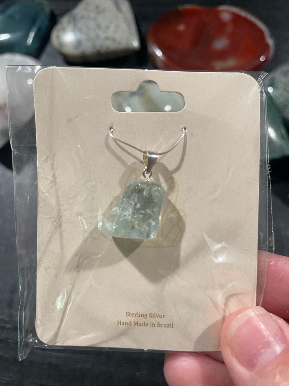 Blue topaz drop style pendant with sterling silver